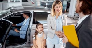 A family secures a vehicle through a rent-to-own car scheme, offering flexible payments and an easier path to car ownership.