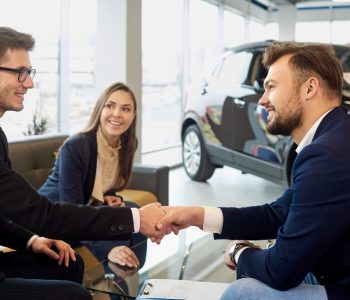 Second chance car finance approval meeting between a customer and dealership finance specialist in Australia
