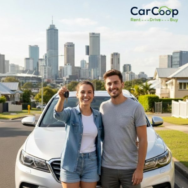 A happy couple standing in front of their white vehicle in Brisbane, holding car keys after securing a rent to own car Brisbane deal with CarCoop.