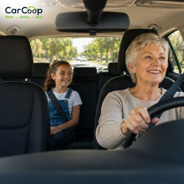 Older woman driving a car with a child in the back seat, representing Car Loans for Pensioners with Bad Credit in Australia